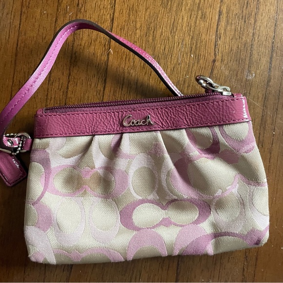 Coach Handbags - Coach Beige Signature Canvas Wristlet with Pink Trim
